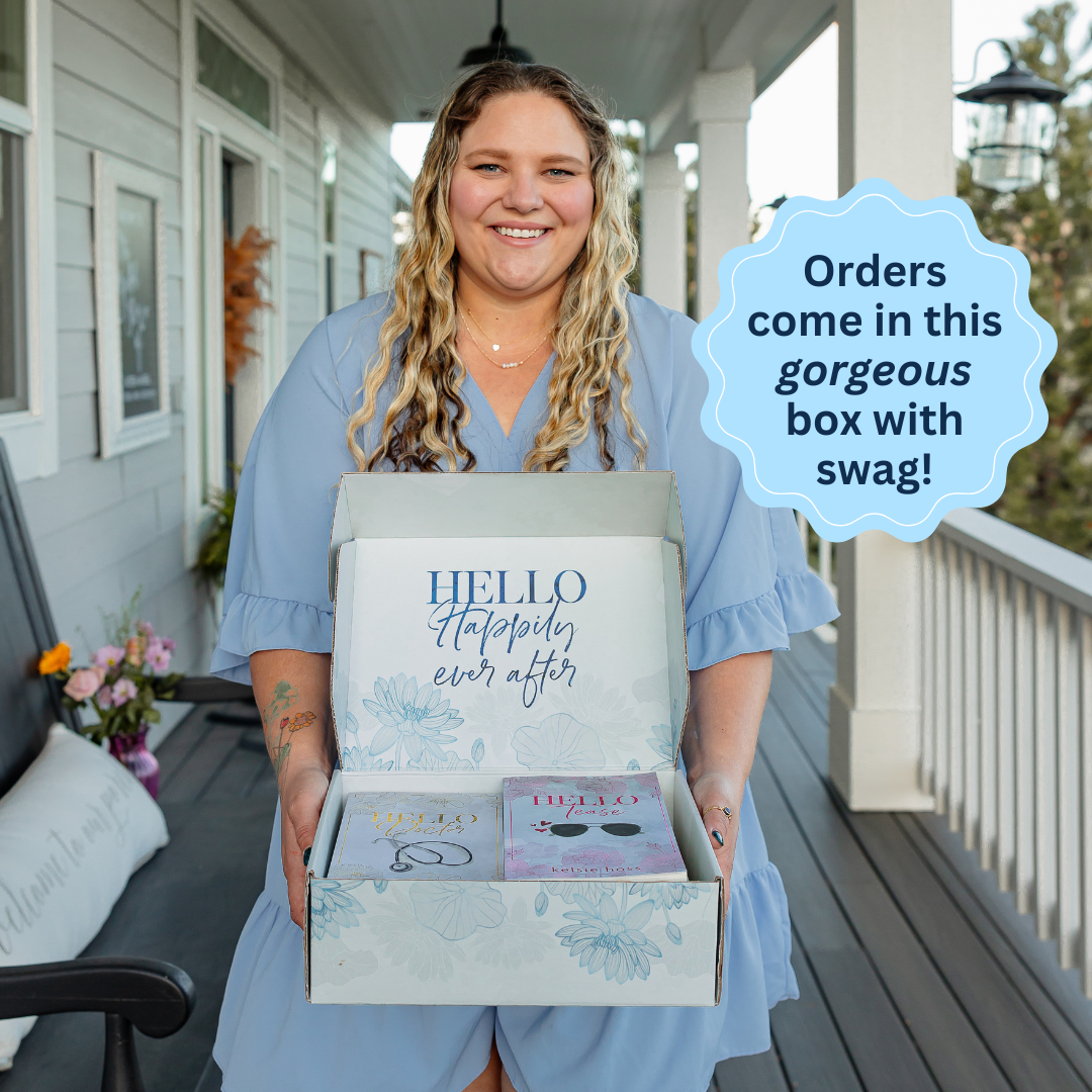 Author Kelsie Hoss holding a decorative book box  with floral designs, and the words Hello Happily Ever After. A blue bubble reads "Orders come in this gorgeous box with swag!" 