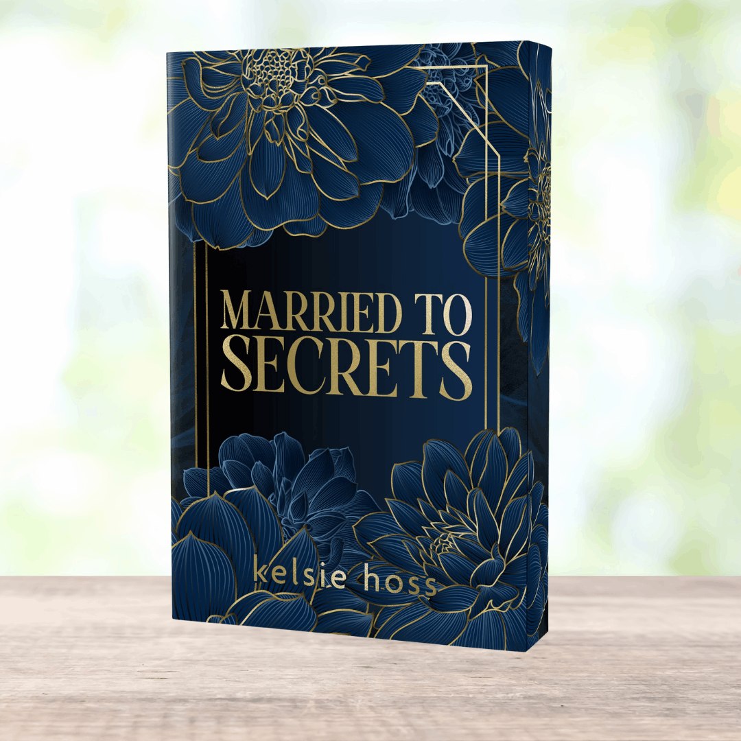 A copy of Married to Secrets by Kelsie Hoss with wraparound black and gold design. 