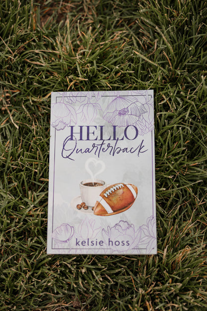 A background of grass centers a paperback book cover. A football sits next to a coffee cup under the words "Hello Quarterback", with the author's name Kelsie Hoss written udnerneath