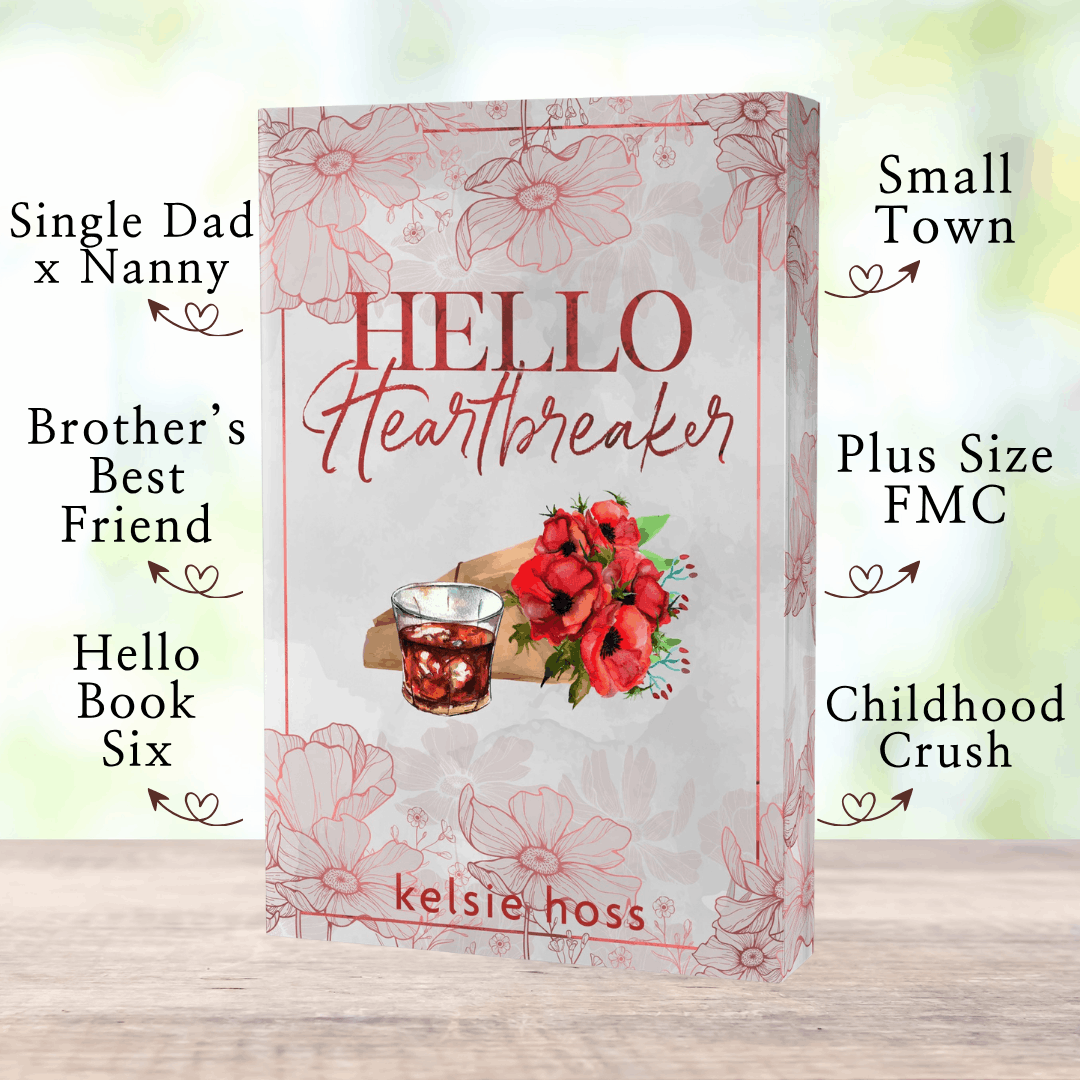 A paperback copy of Hello Heartbreaker with book tropes listed, which are:  Small Town, Plus Size FMC, Childhood Crush, Single Dad x Nanny, Brother's Best Friend, Hello Book Six