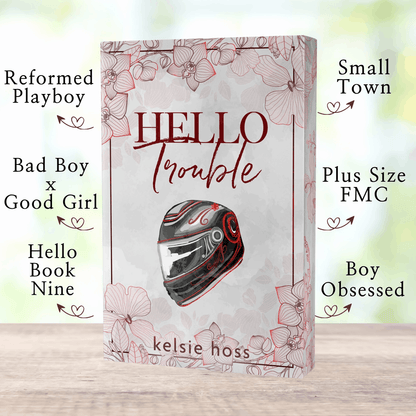 A paperback copy of Hello Trouble with book tropes listed, which are:  Small Town, Plus Size FMC, Boy Obsessed, Hello Book Nine, Bad Boy x Good Girl, Professional Playboy