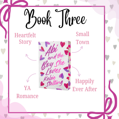 A pretty bow design surrounds a book titled Abi and the Boy She Loves by Kelsie Stelting. Book Three in the series.  Highlights of the book are shown as: Heartfelt Story, Small Town, YA Romance and Happily Ever After